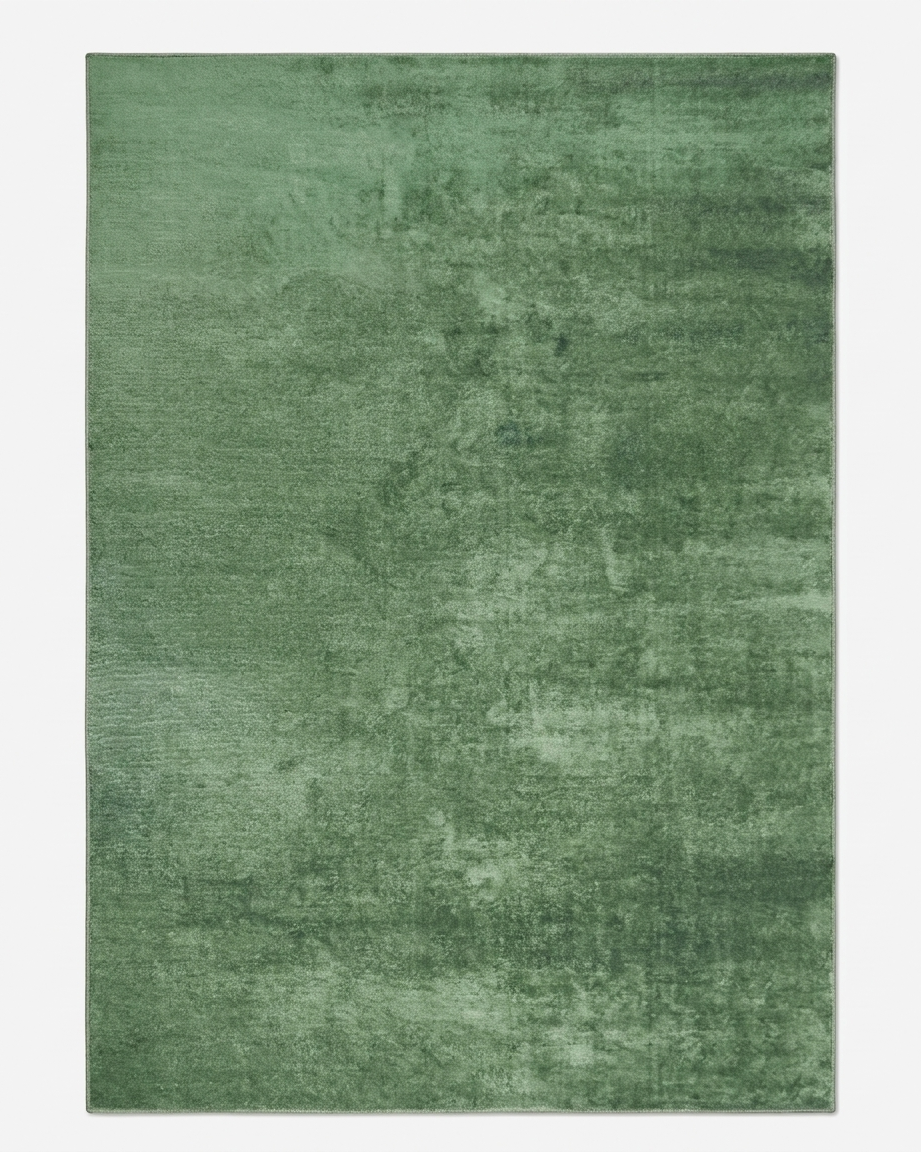Green area rug on a white background