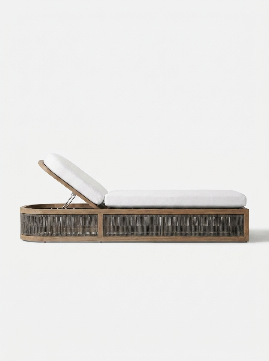 Aeris Sun Lounger, angled view of teak frame and white cushion