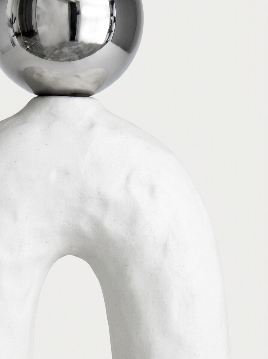 Arko Ceramic Sculpture, close-up of polished chrome-finish sphere on matte ceramic base
