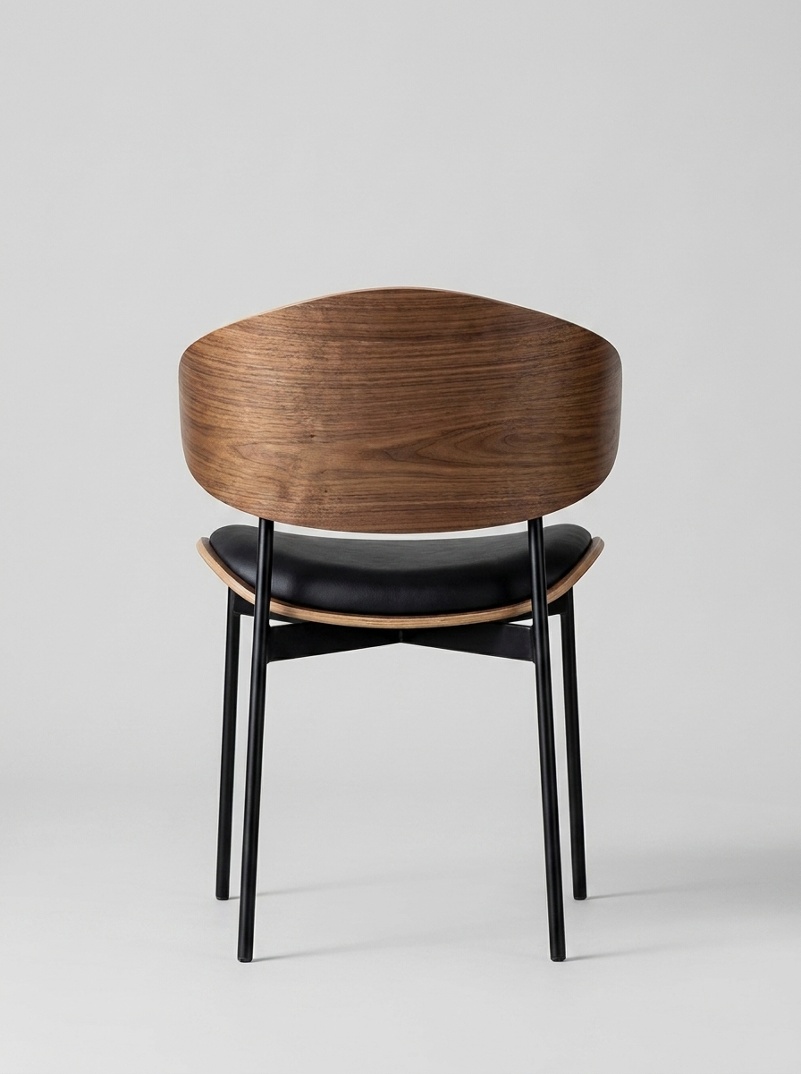 Eik Dining Chair, side view of walnut and black seat