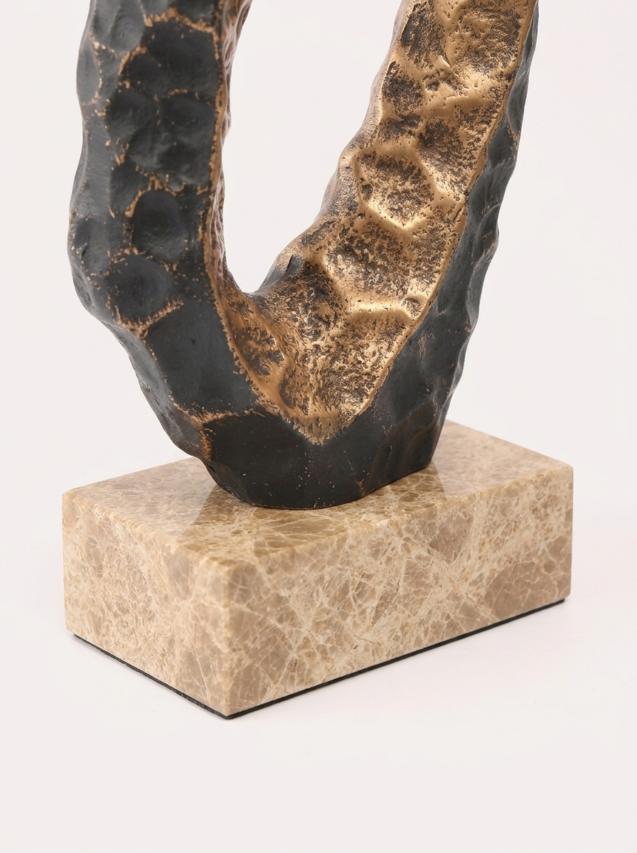 Gloa Sculpture, sculpture in cast metal, angled view