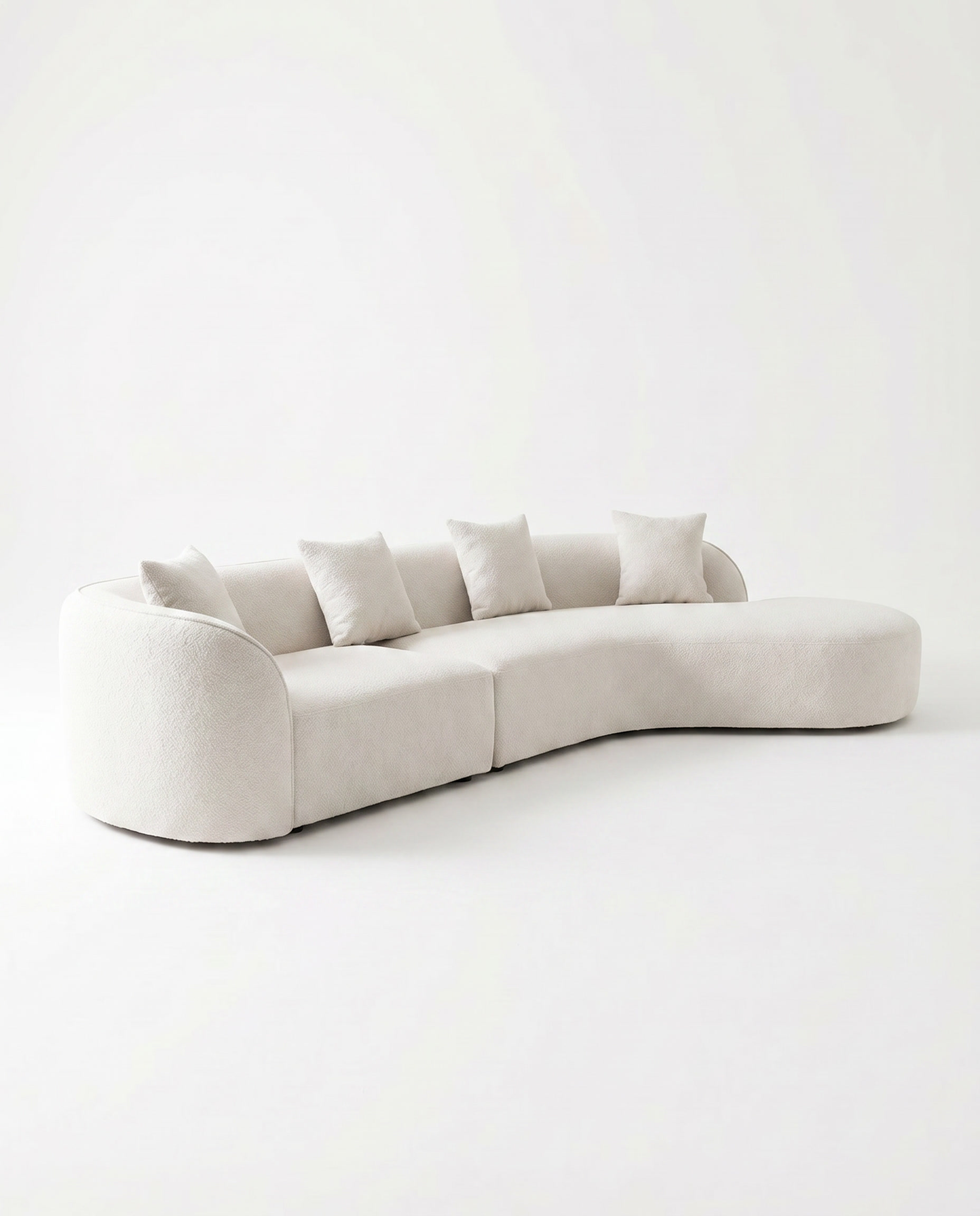 Koln Curved Sofa in Frosted Bone, angled view