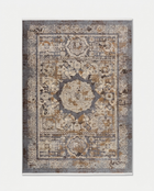 Decorative rug with intricate patterns on a white background