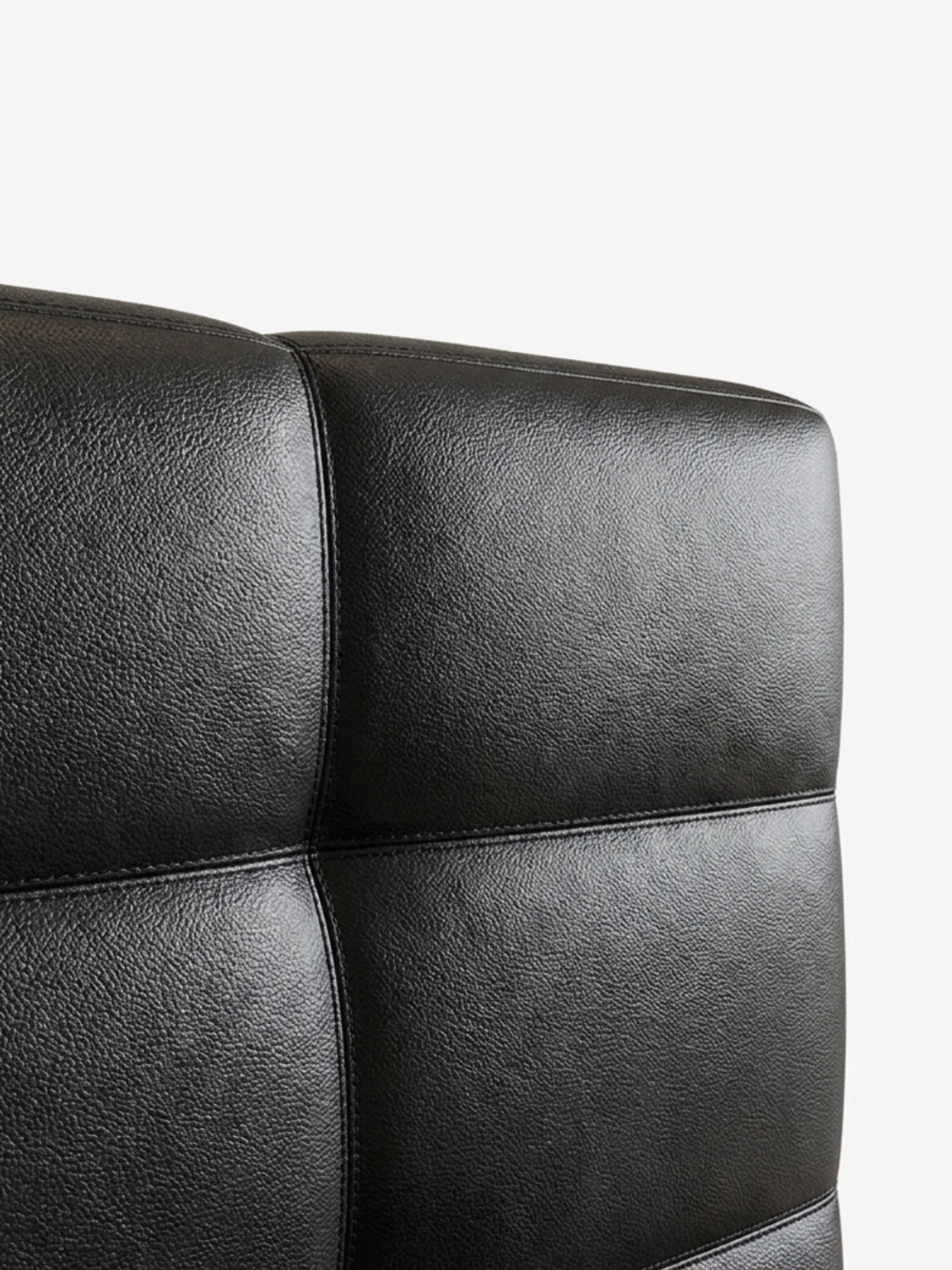 Natt Bed, bed in full-grain Italian leather, angled view
