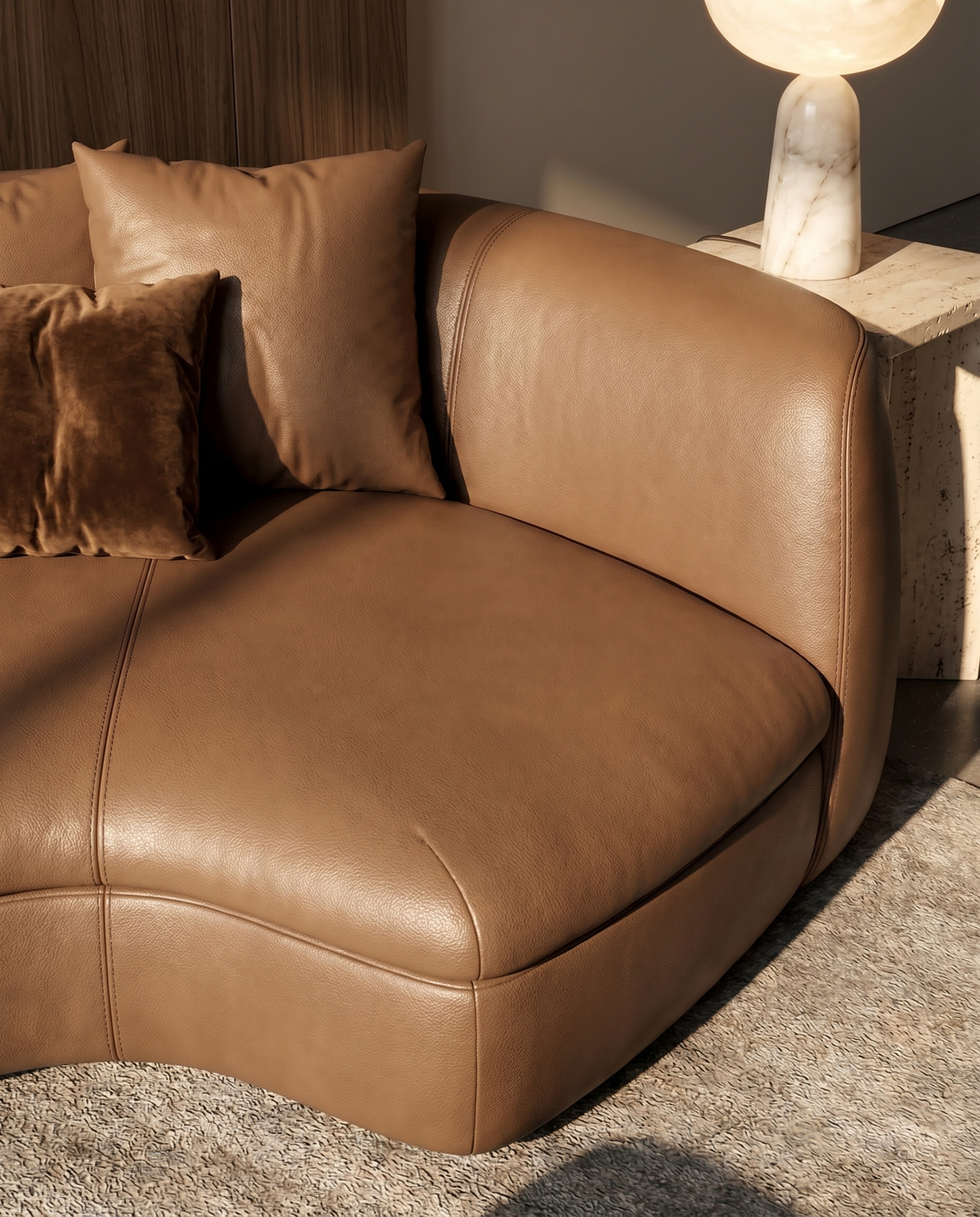 Nohr Curved Sofa in Desert Skin, styled in a room setting