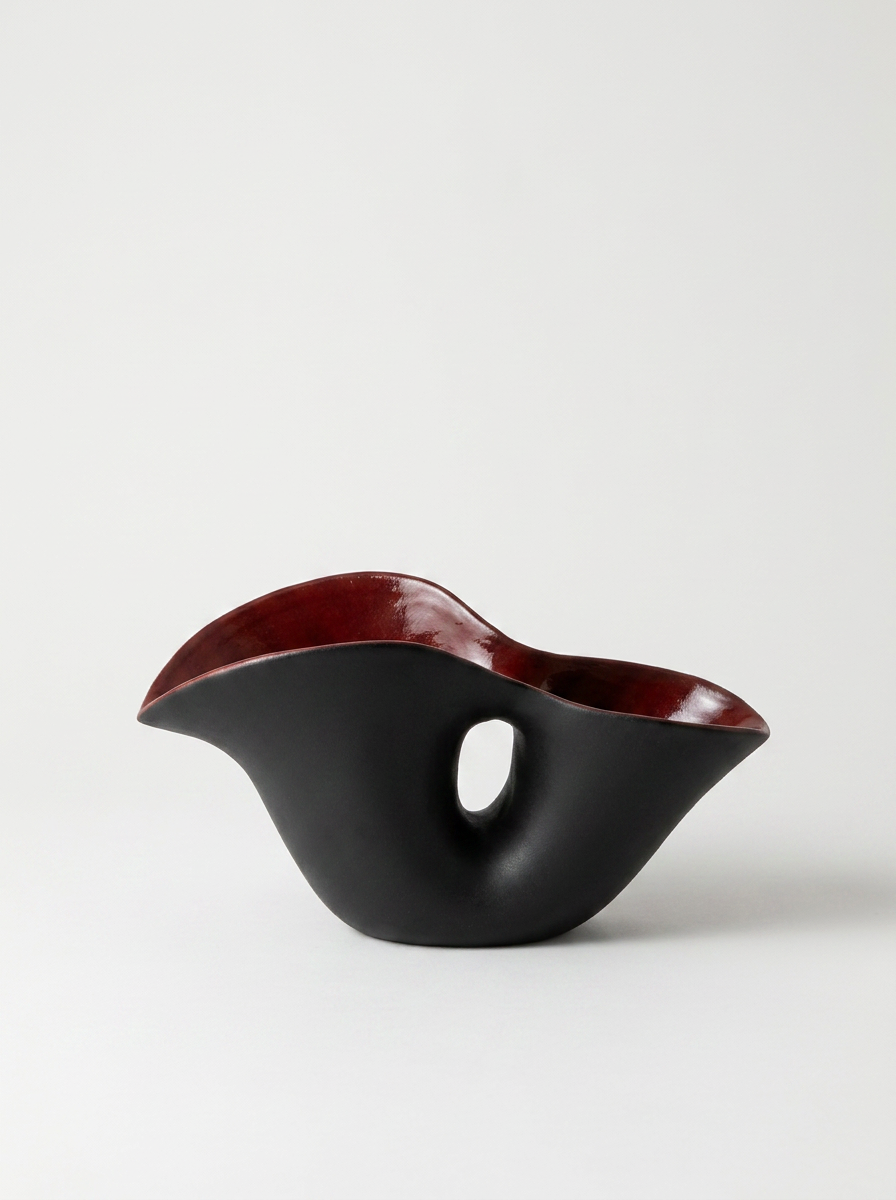 Skal Ceramic Vessel, ceramic vessel in matte black with oxblood-red interior glaze