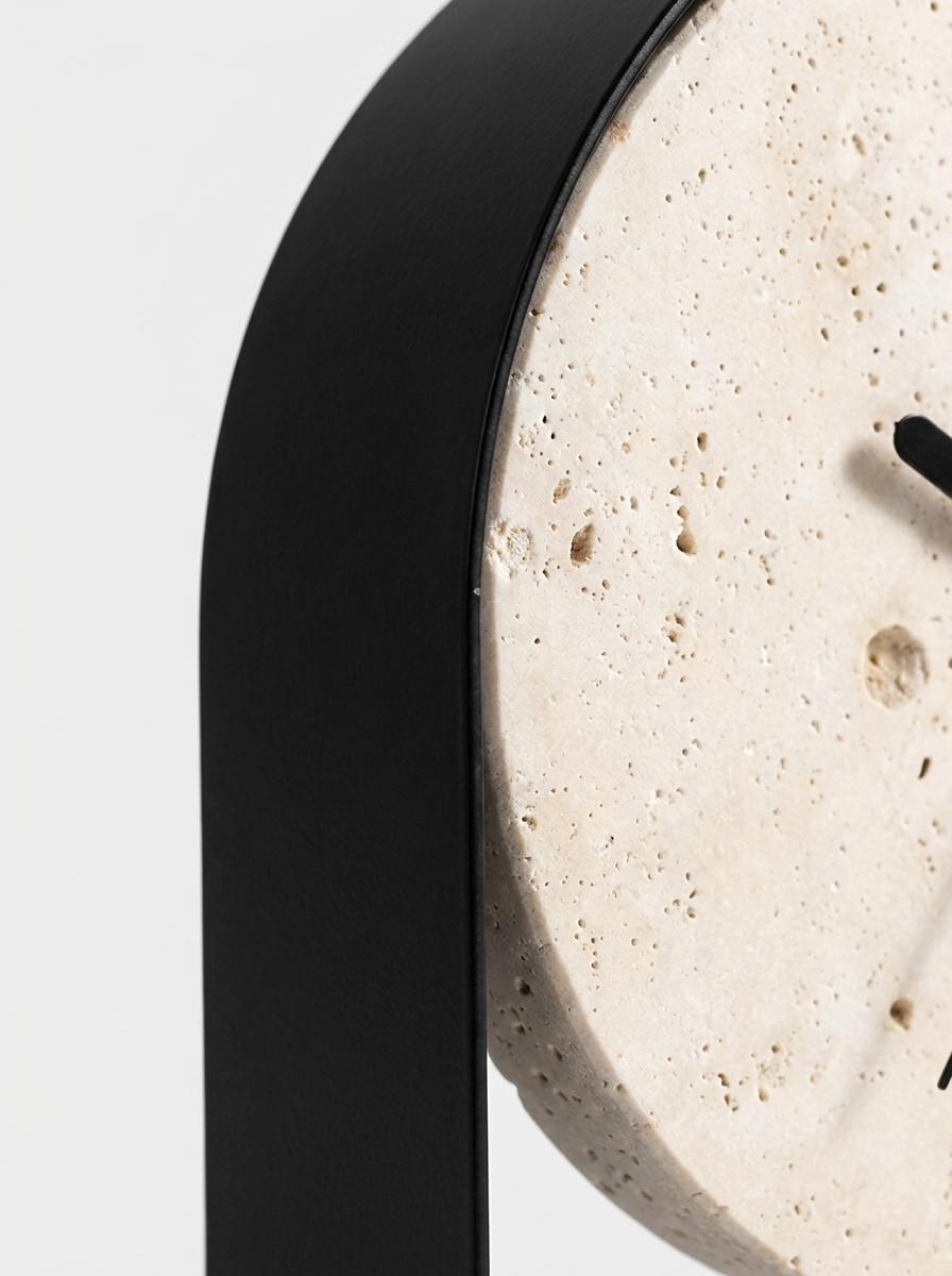 Stund Table Clock, close-up of black frame and travertine stone face