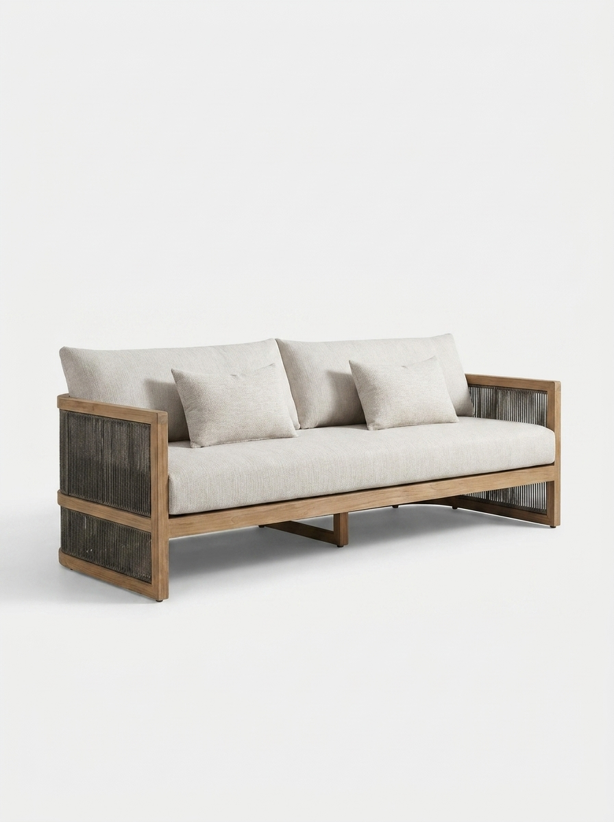 Tarn Outdoor Sofa in Stone Sand, angled view of teak frame and cushions