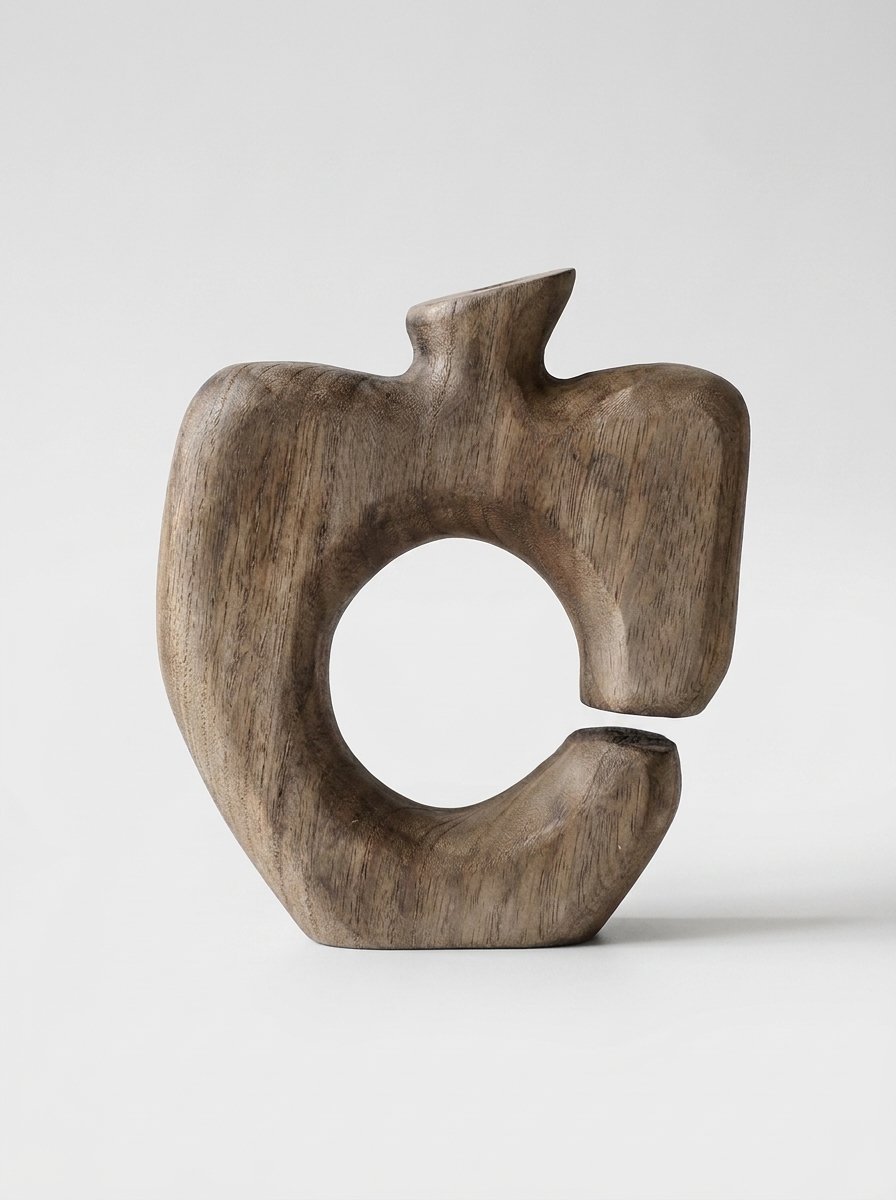 Vagn wooden vase in solid paulownia wood with open asymmetrical silhouette