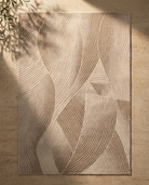 Textured beige rug with abstract pattern on a wooden floor